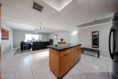Laundry room with washer/dryer in unit. You read that correctly on Scottsdale Shadows in Arizona - for sale on GolfHomes.com, golf home, golf lot