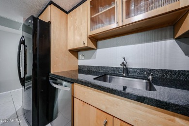 Laundry room with washer/dryer in unit. You read that correctly on Scottsdale Shadows in Arizona - for sale on GolfHomes.com, golf home, golf lot