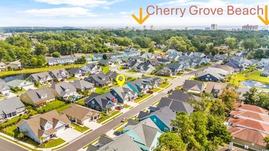 Discover luxury coastal living in this 5-bedroom, 3.5-bath on Surf Golf and Beach Club in South Carolina - for sale on GolfHomes.com, golf home, golf lot