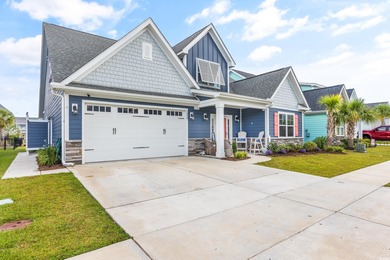 Discover luxury coastal living in this 5-bedroom, 3.5-bath on Surf Golf and Beach Club in South Carolina - for sale on GolfHomes.com, golf home, golf lot