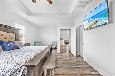 Discover luxury coastal living in this 5-bedroom, 3.5-bath on Surf Golf and Beach Club in South Carolina - for sale on GolfHomes.com, golf home, golf lot