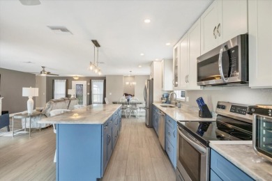 Discover the perfect Florida retreat in this charming and on Rotonda Golf and Country Club The Hills Course in Florida - for sale on GolfHomes.com, golf home, golf lot