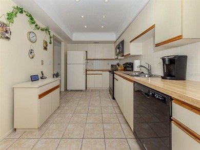 This  2 bedroom/2 bathroom condo is one of three on the second on Capri Isle Golf Club in Florida - for sale on GolfHomes.com, golf home, golf lot