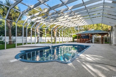 Elegant Spacious living with a fabulous Sunroom overlooking the on Arcadian Shores Golf Club in South Carolina - for sale on GolfHomes.com, golf home, golf lot