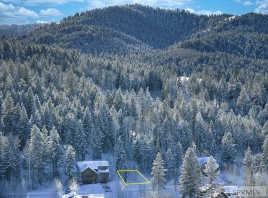 Discover this rare elevated cabin lot in one of the few areas of on Teton Springs Resort and Club in Idaho - for sale on GolfHomes.com, golf home, golf lot