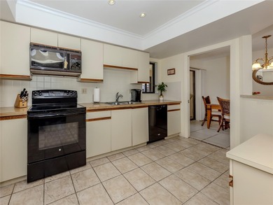 This  2 bedroom/2 bathroom condo is one of three on the second on Capri Isle Golf Club in Florida - for sale on GolfHomes.com, golf home, golf lot