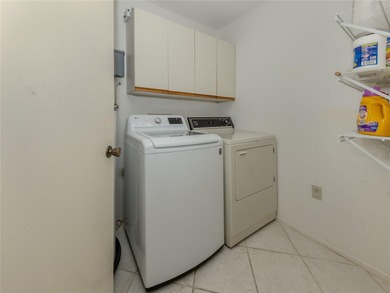 This  2 bedroom/2 bathroom condo is one of three on the second on Capri Isle Golf Club in Florida - for sale on GolfHomes.com, golf home, golf lot