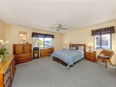 This  2 bedroom/2 bathroom condo is one of three on the second on Capri Isle Golf Club in Florida - for sale on GolfHomes.com, golf home, golf lot