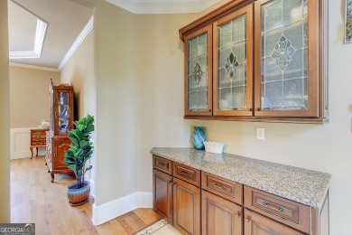 Welcome to 805 Cog Hill - Country Club Living at Its Finest! on Eagles Landing Country Club in Georgia - for sale on GolfHomes.com, golf home, golf lot