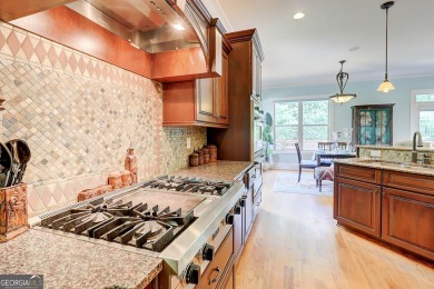 Welcome to 805 Cog Hill - Country Club Living at Its Finest! on Eagles Landing Country Club in Georgia - for sale on GolfHomes.com, golf home, golf lot
