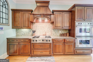 Welcome to 805 Cog Hill - Country Club Living at Its Finest! on Eagles Landing Country Club in Georgia - for sale on GolfHomes.com, golf home, golf lot