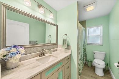 Discover the perfect Florida retreat in this charming and on Rotonda Golf and Country Club The Hills Course in Florida - for sale on GolfHomes.com, golf home, golf lot