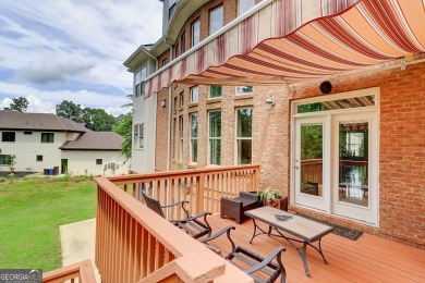Welcome to 805 Cog Hill - Country Club Living at Its Finest! on Eagles Landing Country Club in Georgia - for sale on GolfHomes.com, golf home, golf lot