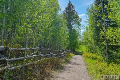 Discover a rare opportunity to own an elevated cabin lot in one on Teton Springs Resort and Club in Idaho - for sale on GolfHomes.com, golf home, golf lot