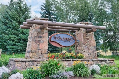 Discover a rare opportunity to own an elevated cabin lot in one on Teton Springs Resort and Club in Idaho - for sale on GolfHomes.com, golf home, golf lot