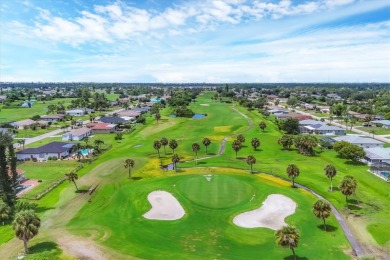 Discover the perfect Florida retreat in this charming and on Rotonda Golf and Country Club The Hills Course in Florida - for sale on GolfHomes.com, golf home, golf lot