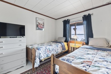 Stunning Waterfront Cottage on Sebago Lake - Fully Furnished on Frye Island Golf Club in Maine - for sale on GolfHomes.com, golf home, golf lot