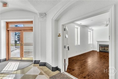 This first-floor residence offers convenient dual entrances - on Wilmington Island Club in Georgia - for sale on GolfHomes.com, golf home, golf lot