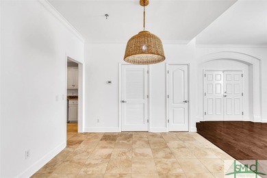 This first-floor residence offers convenient dual entrances - on Wilmington Island Club in Georgia - for sale on GolfHomes.com, golf home, golf lot