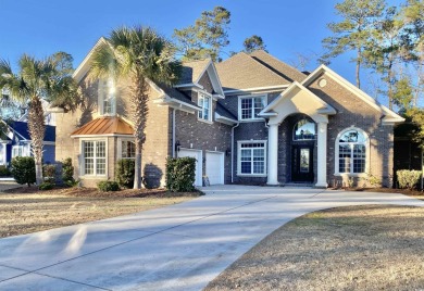 This spacious traditional home has volume ceilings throughout on Heron Point Golf Club in South Carolina - for sale on GolfHomes.com, golf home, golf lot