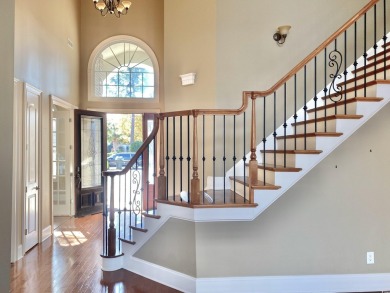 This spacious traditional home has volume ceilings throughout on Heron Point Golf Club in South Carolina - for sale on GolfHomes.com, golf home, golf lot