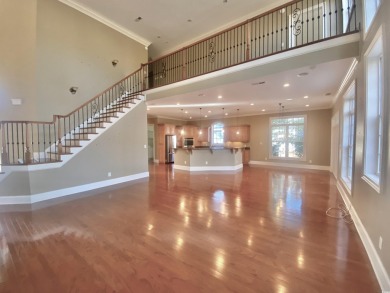 This spacious traditional home has volume ceilings throughout on Heron Point Golf Club in South Carolina - for sale on GolfHomes.com, golf home, golf lot