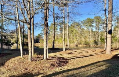 This spacious traditional home has volume ceilings throughout on Heron Point Golf Club in South Carolina - for sale on GolfHomes.com, golf home, golf lot