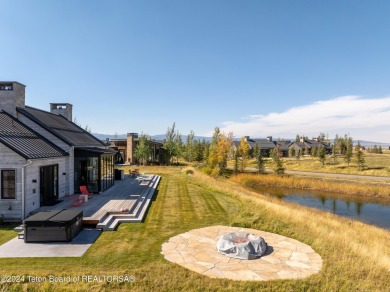 Stunning 4 bed, 4.5 bath Tributary Cabin with pond & Teton on Huntsman Springs Golf Club in Idaho - for sale on GolfHomes.com, golf home, golf lot