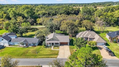 Welcome to this beautiful modern home located inside the gated on Lake Kiowa Golf Course in Texas - for sale on GolfHomes.com, golf home, golf lot