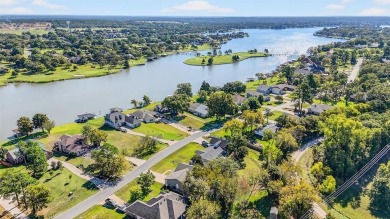 Welcome to this beautiful modern home located inside the gated on Lake Kiowa Golf Course in Texas - for sale on GolfHomes.com, golf home, golf lot