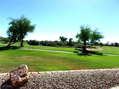 A Retreat on the Fairway. This 3-bedroom, 2-bath home on Mojave Resort Golf Club in Nevada - for sale on GolfHomes.com, golf home, golf lot