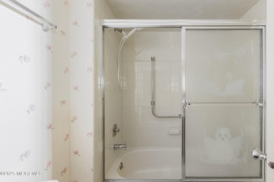 Ground level living in 55+ Covered Bridge II with two bedrooms on Pine Brook Golf Course in New Jersey - for sale on GolfHomes.com, golf home, golf lot