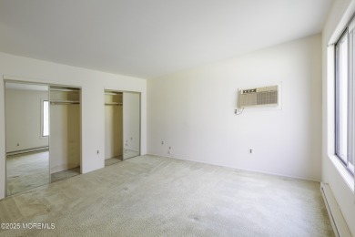Ground level living in 55+ Covered Bridge II with two bedrooms on Pine Brook Golf Course in New Jersey - for sale on GolfHomes.com, golf home, golf lot