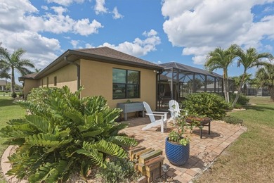 Welcome to this beautifully crafted DM Dean custom-built home on Seminole Lakes Country Club in Florida - for sale on GolfHomes.com, golf home, golf lot