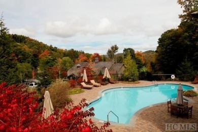 This lot offers a beautiful setting with expansive mountain on Old Edwards Club in North Carolina - for sale on GolfHomes.com, golf home, golf lot