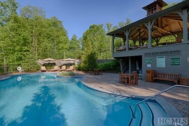 This lot offers a beautiful setting with expansive mountain on Old Edwards Club in North Carolina - for sale on GolfHomes.com, golf home, golf lot