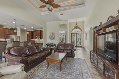 Welcome to this beautifully crafted DM Dean custom-built home on Seminole Lakes Country Club in Florida - for sale on GolfHomes.com, golf home, golf lot