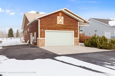 This well-kept, cedar-sided custom home on the golf course in on Star Valley RV Golf Course in Wyoming - for sale on GolfHomes.com, golf home, golf lot