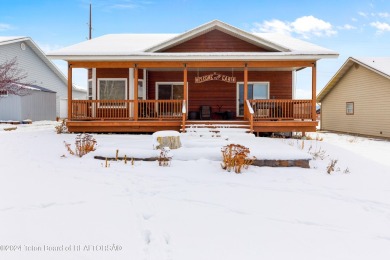 This well-kept, cedar-sided custom home on the golf course in on Star Valley RV Golf Course in Wyoming - for sale on GolfHomes.com, golf home, golf lot