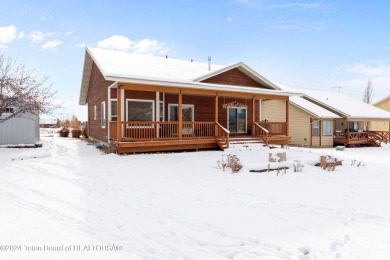 This well-kept, cedar-sided custom home on the golf course in on Star Valley RV Golf Course in Wyoming - for sale on GolfHomes.com, golf home, golf lot