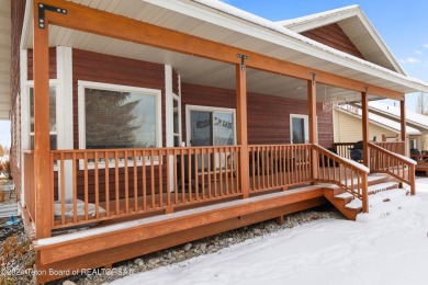 This well-kept, cedar-sided custom home on the golf course in on Star Valley RV Golf Course in Wyoming - for sale on GolfHomes.com, golf home, golf lot