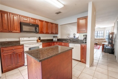 If you're looking for a move-in ready townhome in a great on Tampa Palms Golf and Country Club in Florida - for sale on GolfHomes.com, golf home, golf lot