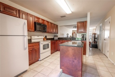 If you're looking for a move-in ready townhome in a great on Tampa Palms Golf and Country Club in Florida - for sale on GolfHomes.com, golf home, golf lot