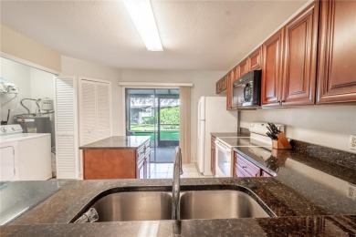 If you're looking for a move-in ready townhome in a great on Tampa Palms Golf and Country Club in Florida - for sale on GolfHomes.com, golf home, golf lot