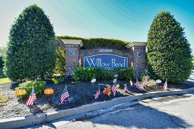 Discover coastal comfort in this well-appointed 2-bed, 2-bath on Barefoot Resort and Golf Club  in South Carolina - for sale on GolfHomes.com, golf home, golf lot