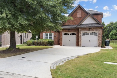 Welcome to this beautiful 4-bed, 3-bath red brick home in the on Ironwood Golf and Country Club in North Carolina - for sale on GolfHomes.com, golf home, golf lot