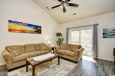 Discover coastal comfort in this well-appointed 2-bed, 2-bath on Barefoot Resort and Golf Club  in South Carolina - for sale on GolfHomes.com, golf home, golf lot