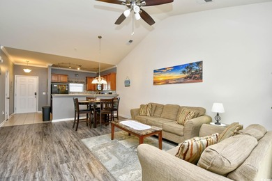 Discover coastal comfort in this well-appointed 2-bed, 2-bath on Barefoot Resort and Golf Club  in South Carolina - for sale on GolfHomes.com, golf home, golf lot