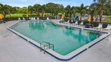 Don't miss this 1st floor unit on the 3rd hole of Gator Trace on Gator Trace Golf and Country Club in Florida - for sale on GolfHomes.com, golf home, golf lot