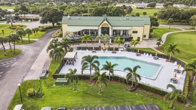 Don't miss this 1st floor unit on the 3rd hole of Gator Trace on Gator Trace Golf and Country Club in Florida - for sale on GolfHomes.com, golf home, golf lot